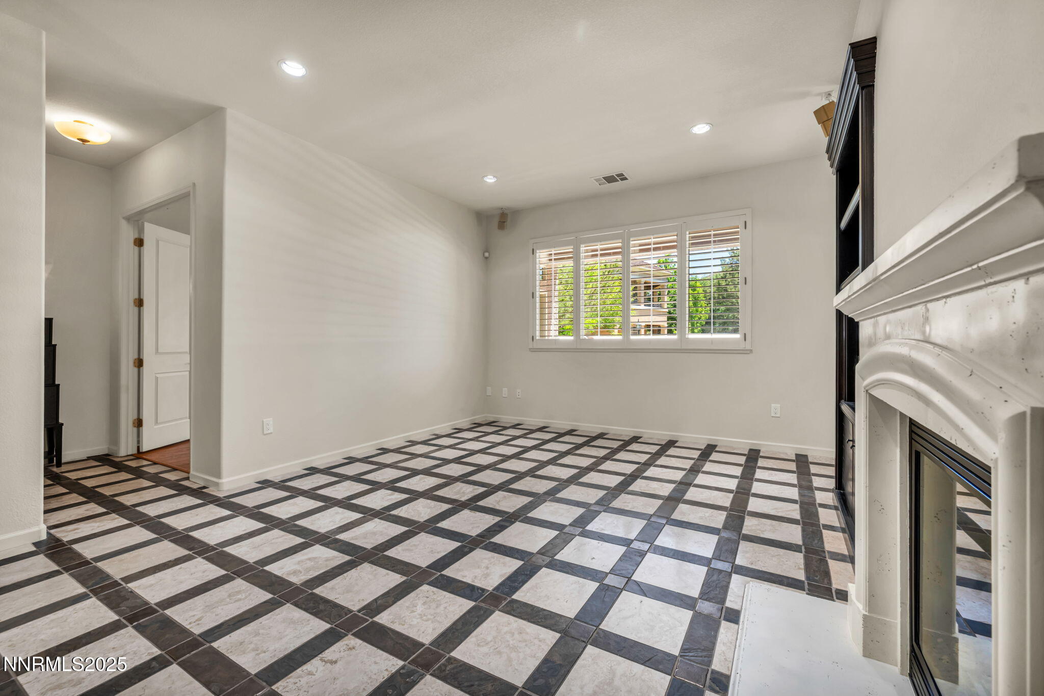 9900 Wilbur May Parkway, Unit 2801 Reno, NV 89521 - Photo 25 of 67 a bedroom with a bed and a window