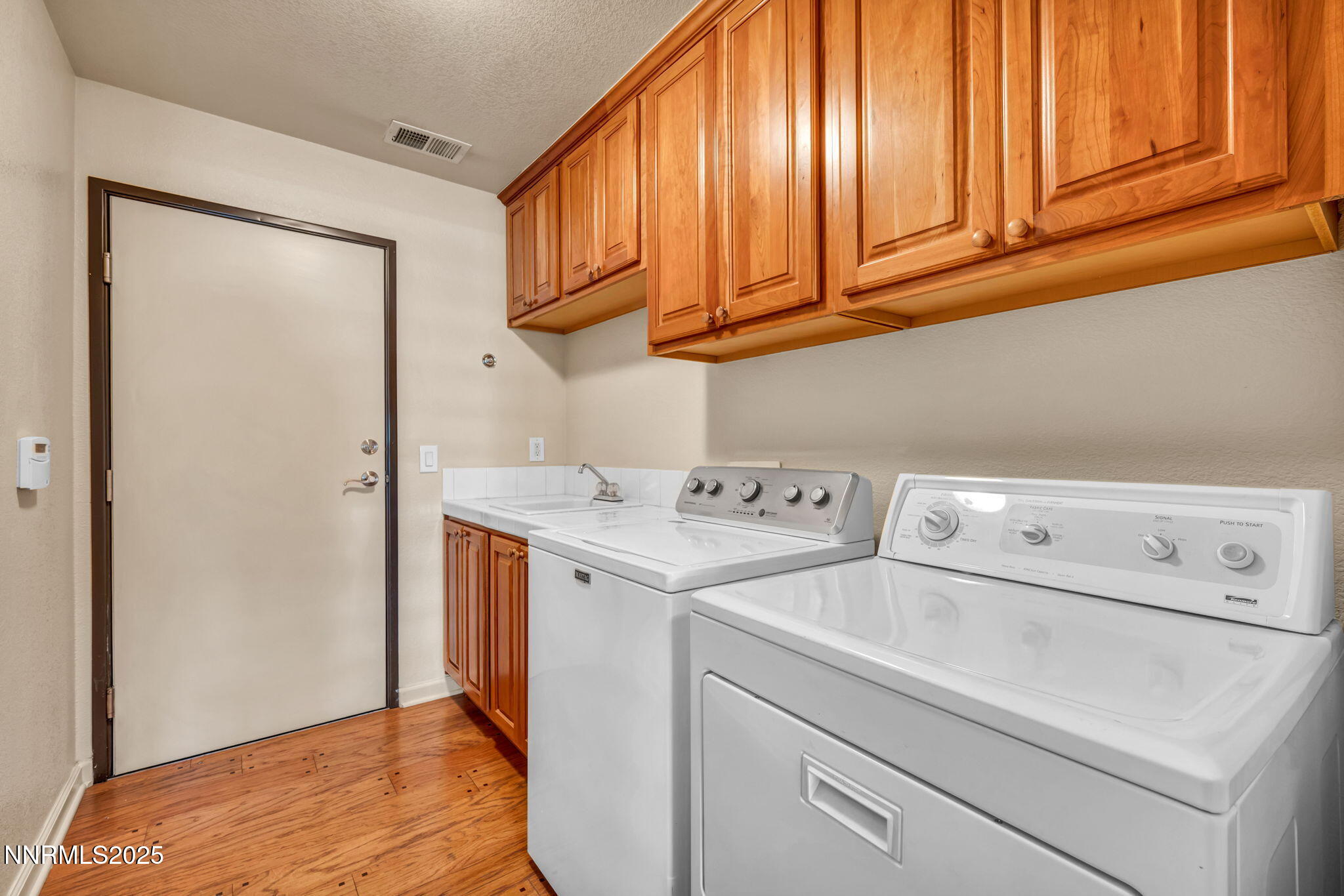 9900 Wilbur May Parkway, Unit 2801 Reno, NV 89521 - Photo 45 of 67 a utility room with dryer and washer