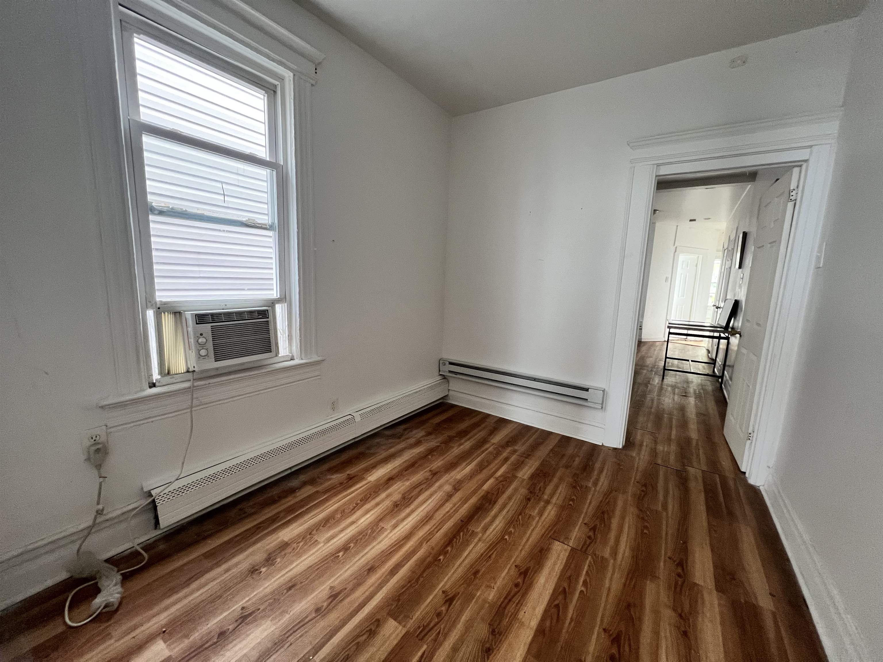 69 Clarke Avenue, Unit 2L Jersey City, NJ 07304 - Photo 8 of 8 a view of a room with wooden floor