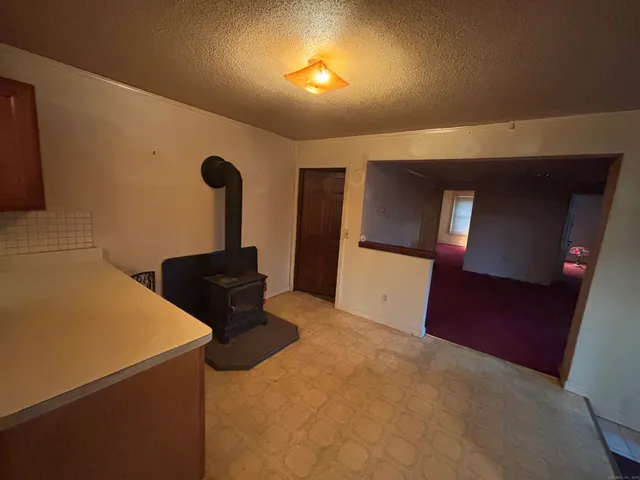 a kitchen that has a sink and a stove