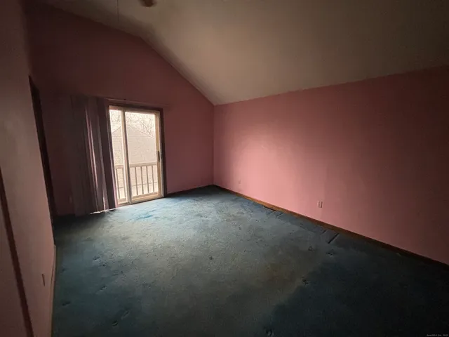 wooden floor and window in an empty room