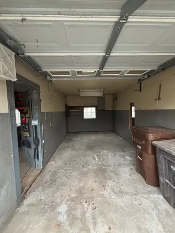 a view of a hallway with stairs