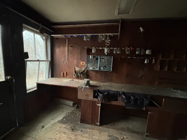 a bathroom with a sink vanity and a mirror