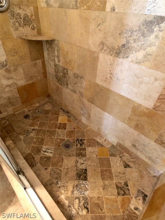 8038 Matanzas Road Fort Myers, FL 33967 - Photo 12 of 27 a bathroom with a shower