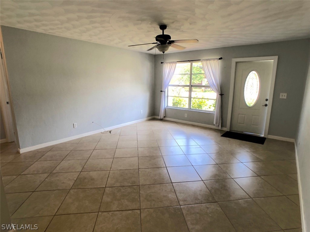 8038 Matanzas Road Fort Myers, FL 33967 - Photo 20 of 27 a view of a livingroom with a window