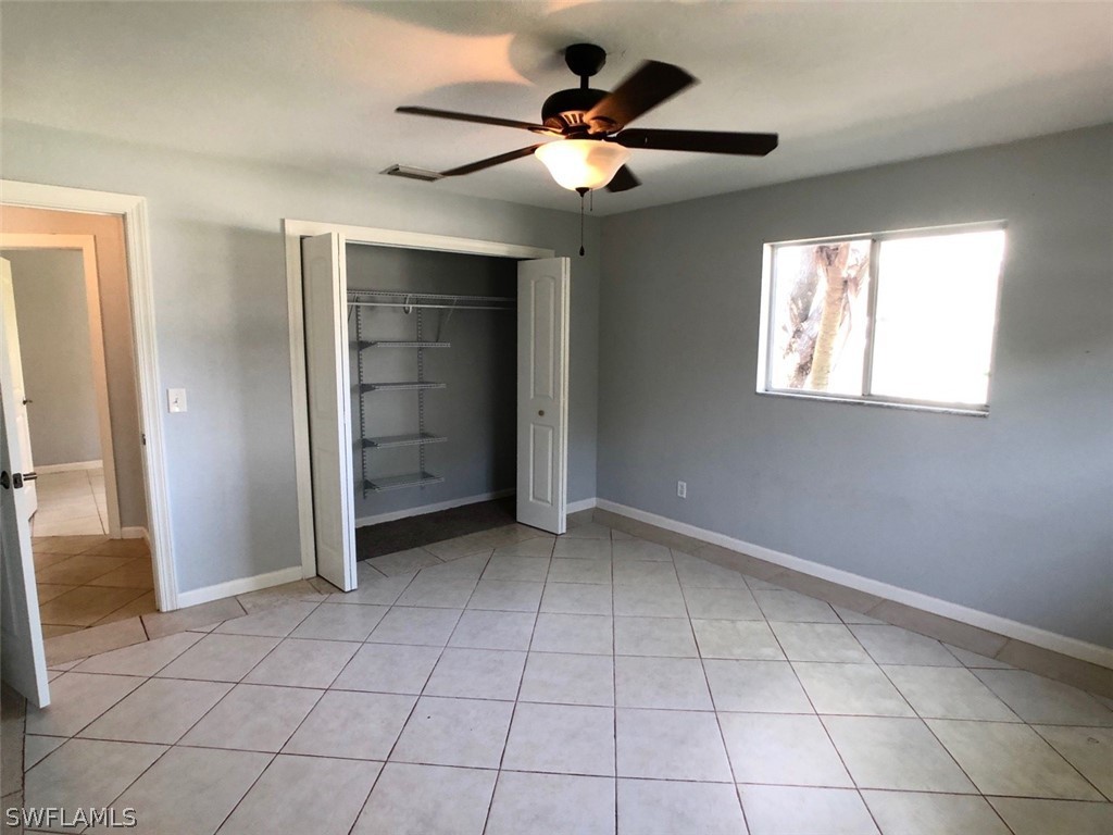 8038 Matanzas Road Fort Myers, FL 33967 - Photo 22 of 27 a view of an empty room with a window