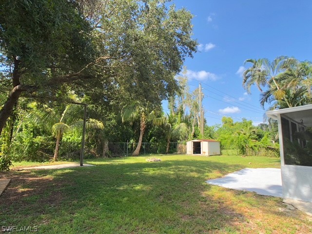 8038 Matanzas Road Fort Myers, FL 33967 - Photo 25 of 27 a view of a house with a yard