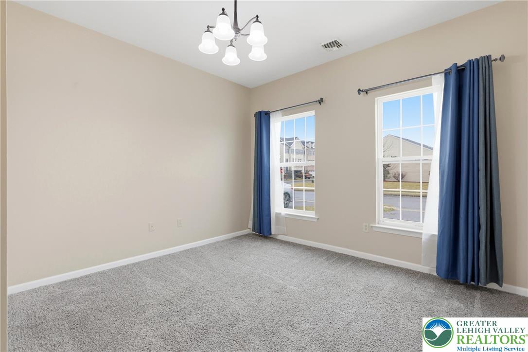 2022 Mercer Way Easton, PA 18040 - Photo 13 of 23 an empty room with windows and closet