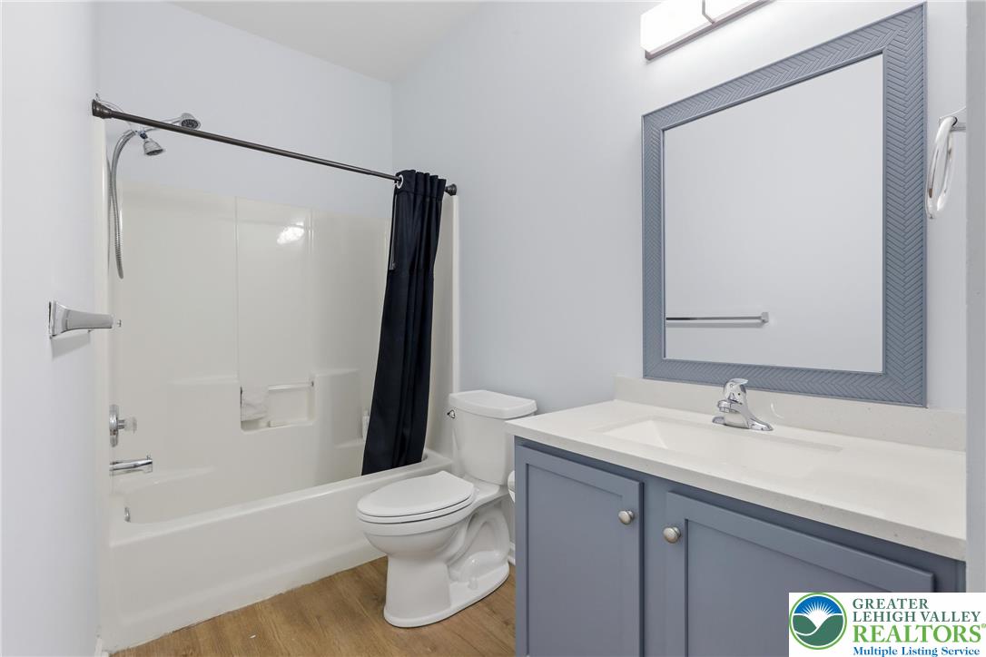 2022 Mercer Way Easton, PA 18040 - Photo 15 of 23 a bathroom with a sink toilet and shower