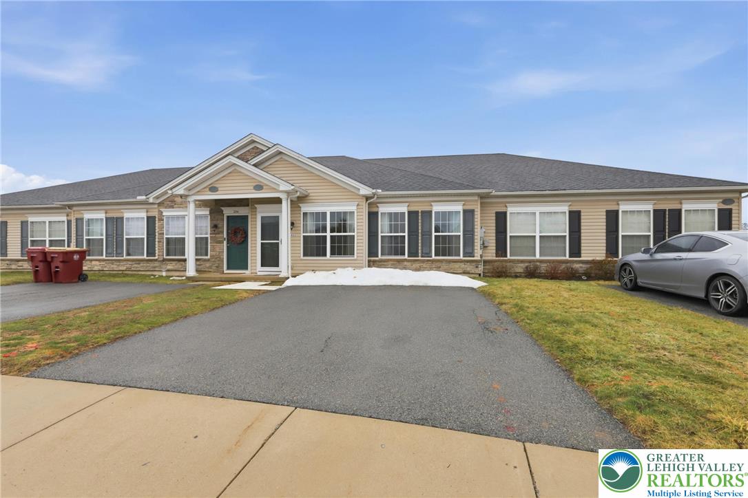 2022 Mercer Way Easton, PA 18040 - Photo 2 of 23 a front view of a house with a yard