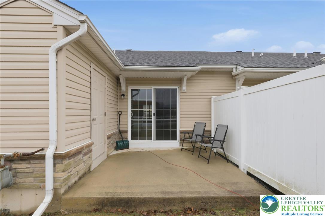 2022 Mercer Way Easton, PA 18040 - Photo 22 of 23 a backyard of a house with table and chairs