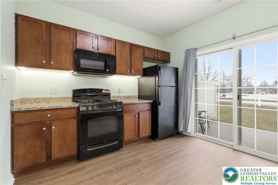 2022 Mercer Way Easton, PA 18040 - Photo 10 of 23 a kitchen with a sink stove and refrigerator