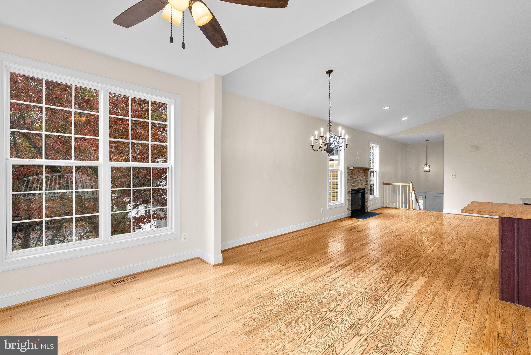 265 Lake Riviera Road Pasadena, MD 21122 - Photo 13 of 37 Living Room w/ Hardwood Floors open to Kitchen