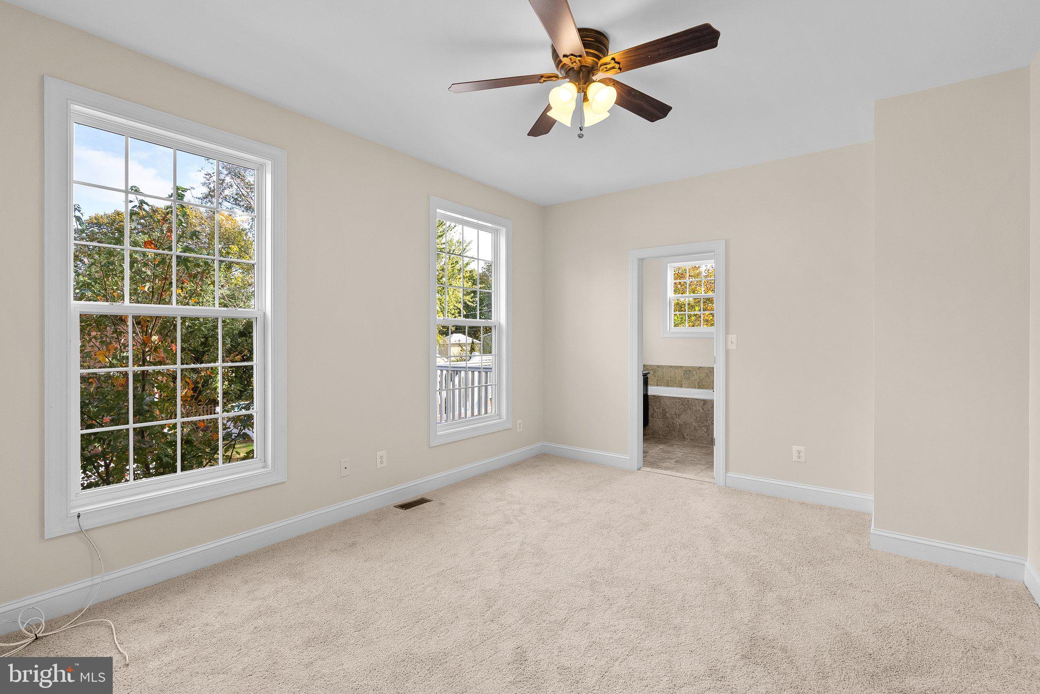 265 Lake Riviera Road Pasadena, MD 21122 - Photo 16 of 37 Primary Bedroom w/ Private Bathroom