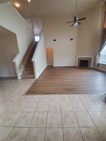 a view of a livingroom with wooden floor