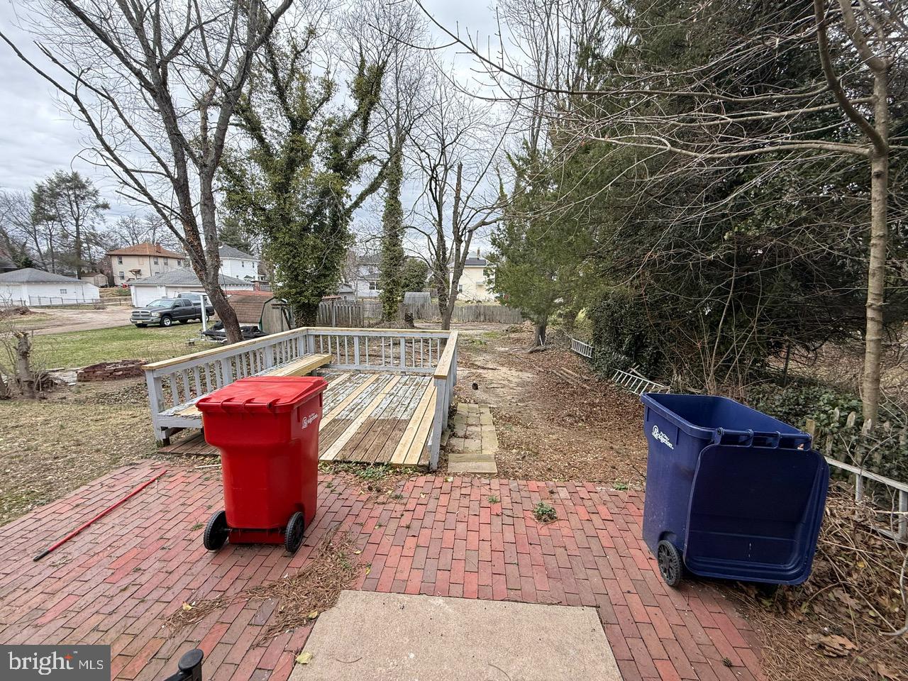 91 Summit Avenue Bridgeton, NJ 08302 - Photo 19 of 20 a wooden bench sitting in middle of a yard