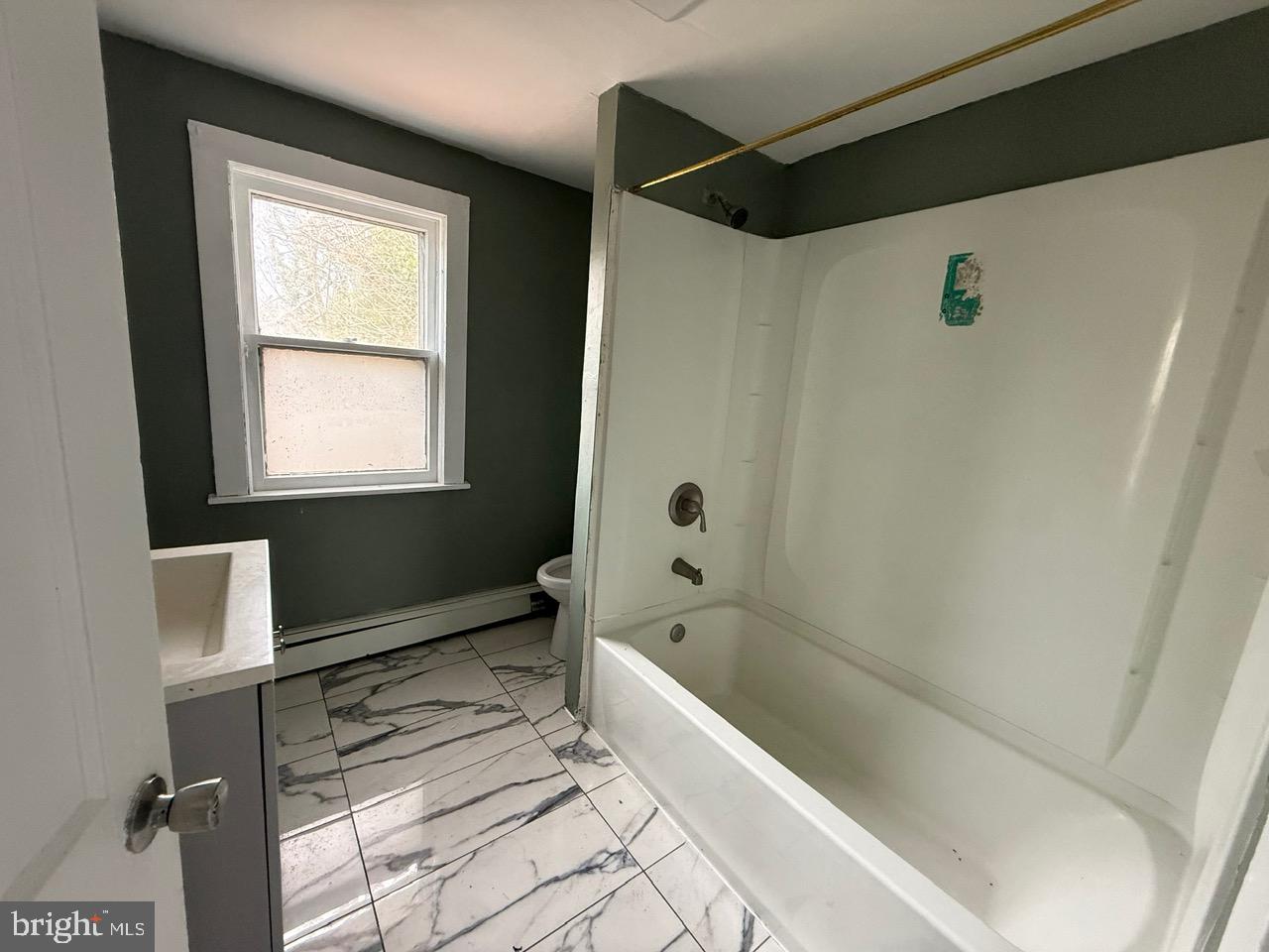 91 Summit Avenue Bridgeton, NJ 08302 - Photo 8 of 20 a bathroom with a bathtub and a shower