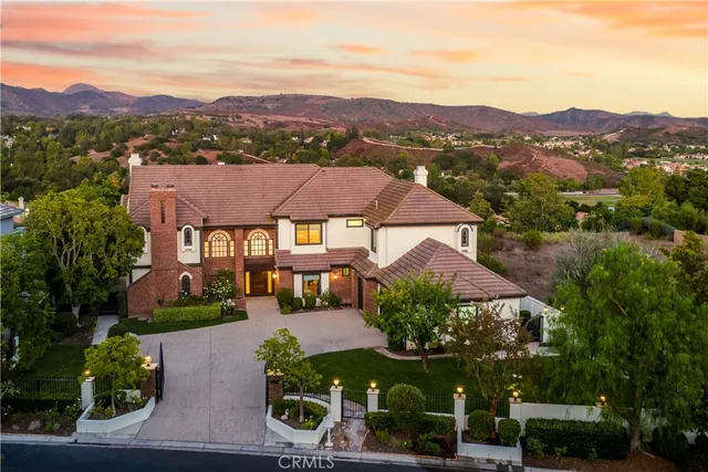 an aerial view of a house with a garden