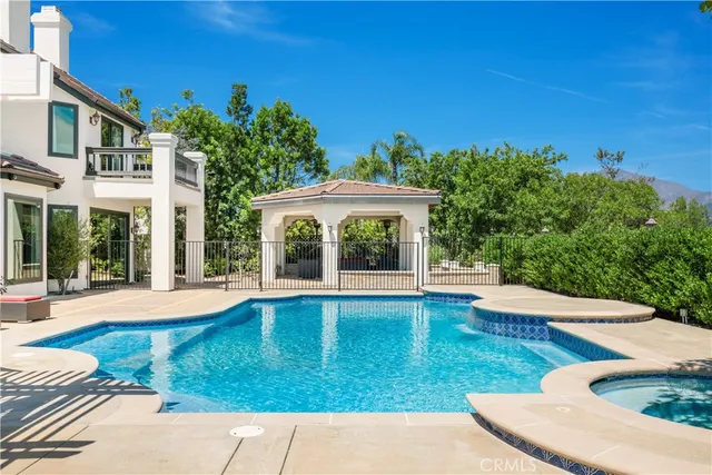 a view of pool with outdoor seating