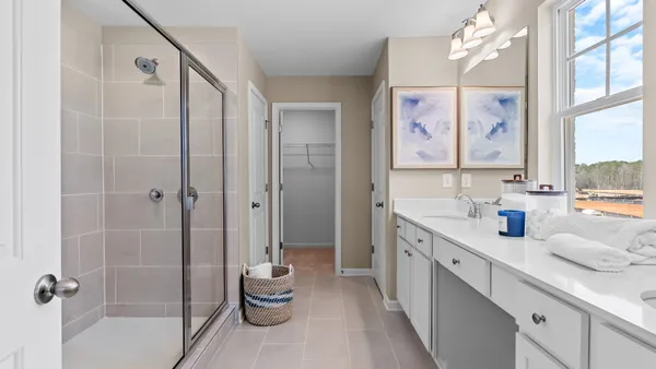 a room with lots of counter space and a wooden floor