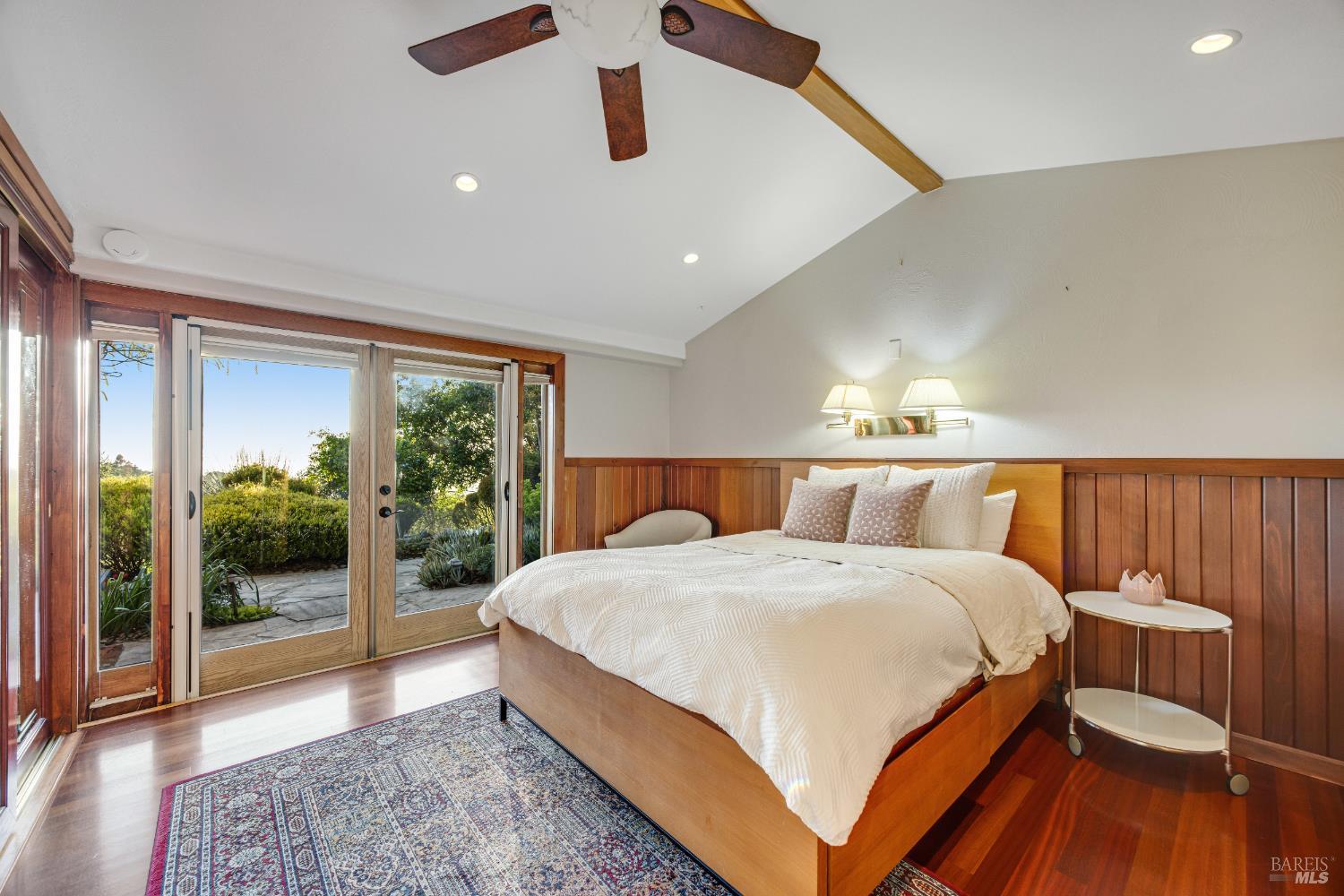 6960 Round Oak Road Penngrove, CA 94951 - Photo 20 of 58 a bed room with a bed and a lamp