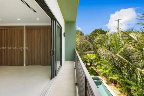 a balcony with a yard