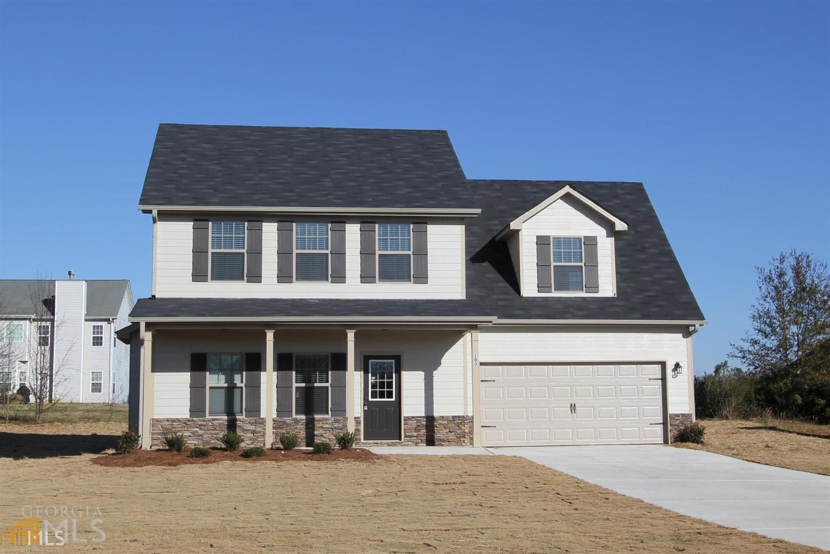 2272 Willoby Court Morrow, GA 30260 - Photo 1 of 1 a front view of a house with a garden