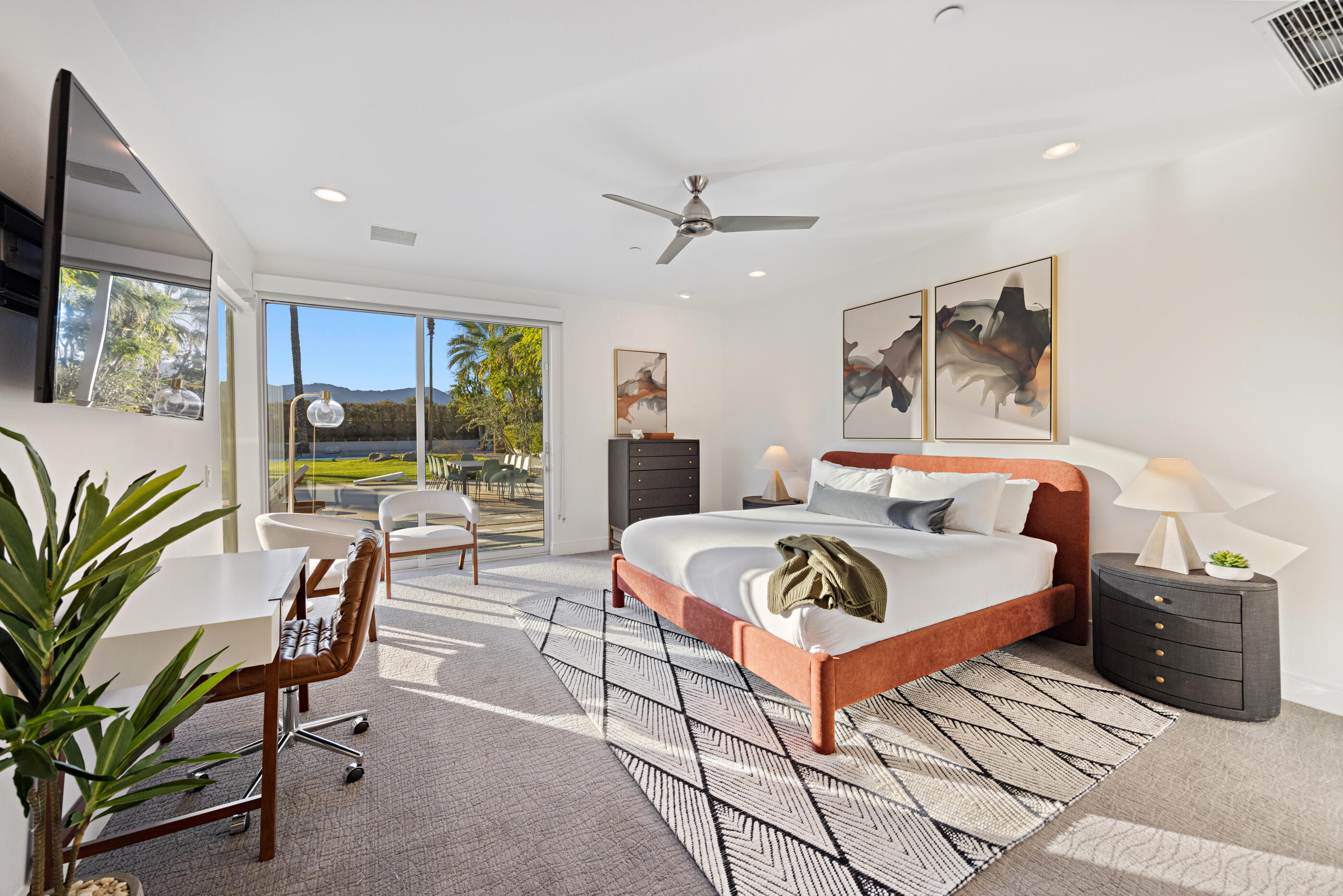 51165 Evangeline Way La Quinta, CA 92253 - Photo 13 of 48 a living room with furniture and a potted plant