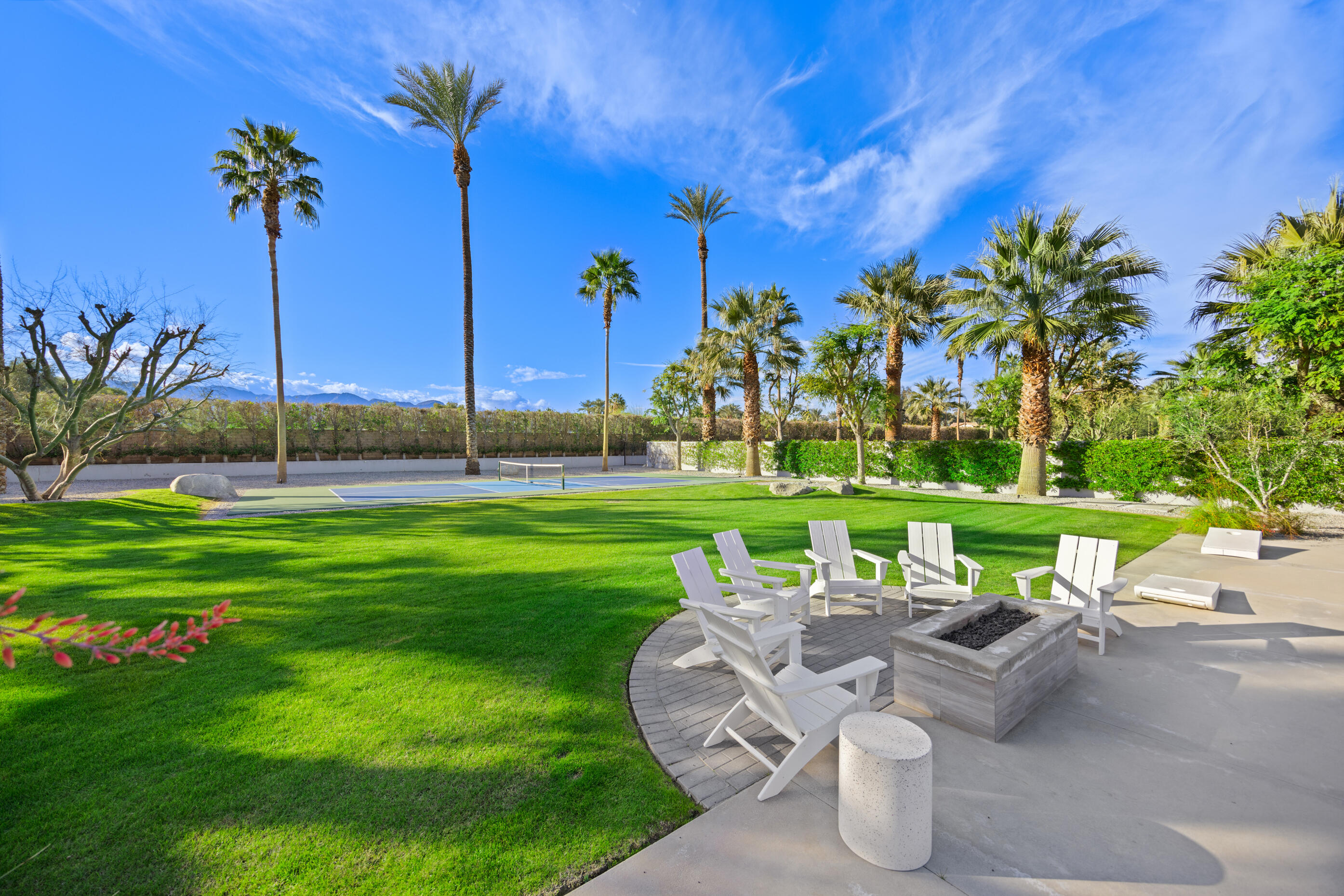 51165 Evangeline Way La Quinta, CA 92253 - Photo 41 of 48 a view of a patio with a table and chairs