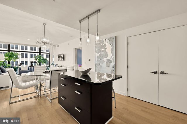 a view of kitchen island kitchen island dining table and chairs