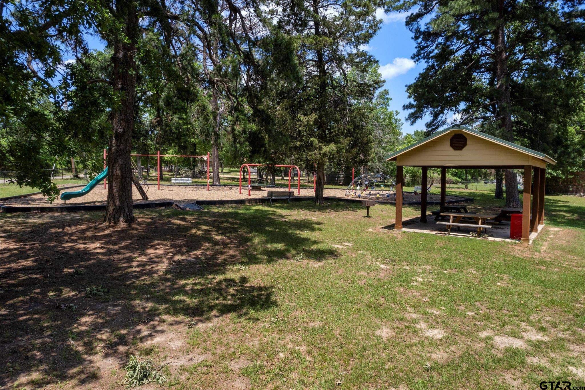 66 R King Fredrick Court Scroggins, TX 75480 - Photo 21 of 21 a view of a house with a yard