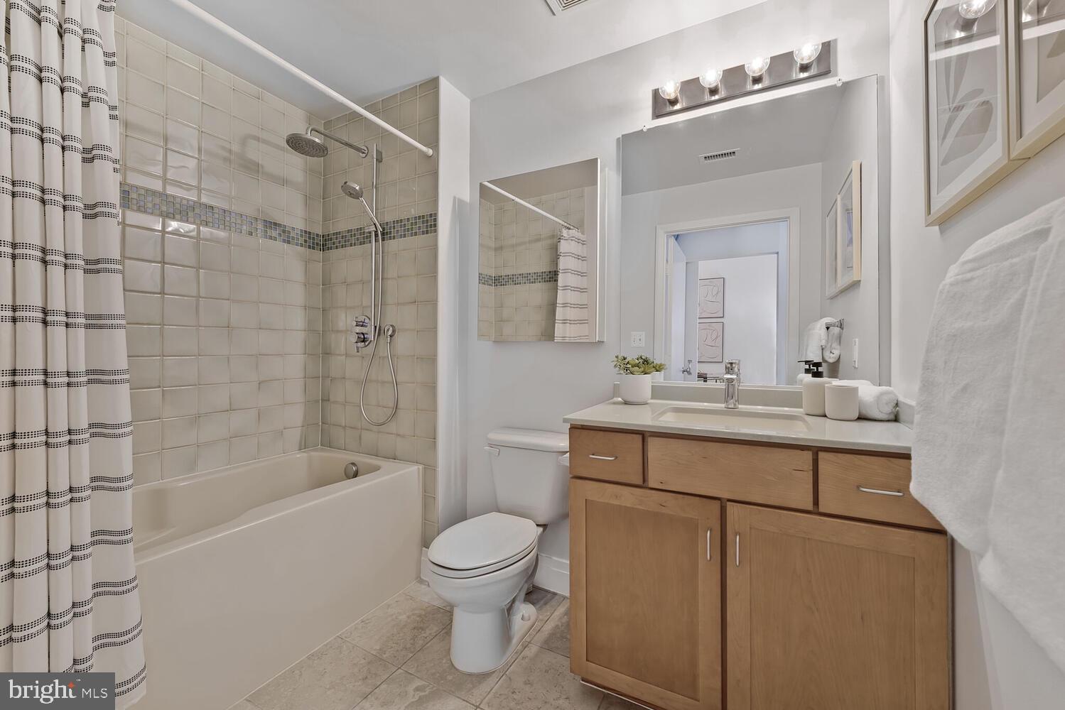 2020 12th Street Northwest, Unit 217 Washington, DC 20009 - Photo 19 of 38 Updated ensuite bath w/a soaking tub