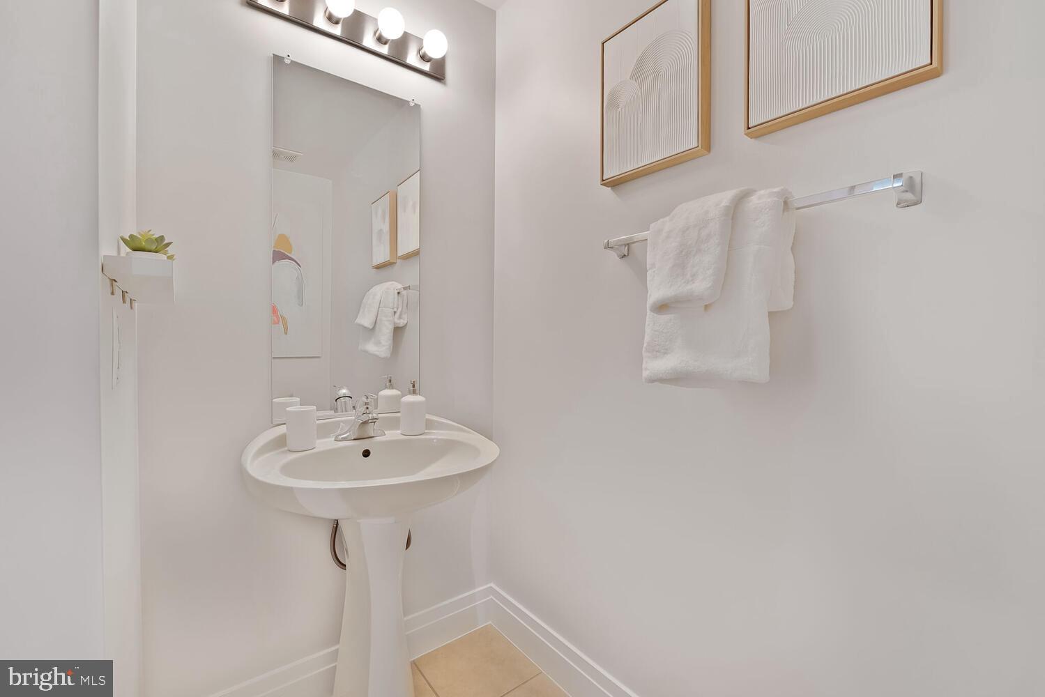 2020 12th Street Northwest, Unit 217 Washington, DC 20009 - Photo 24 of 38 Half bath convenient & tucked away