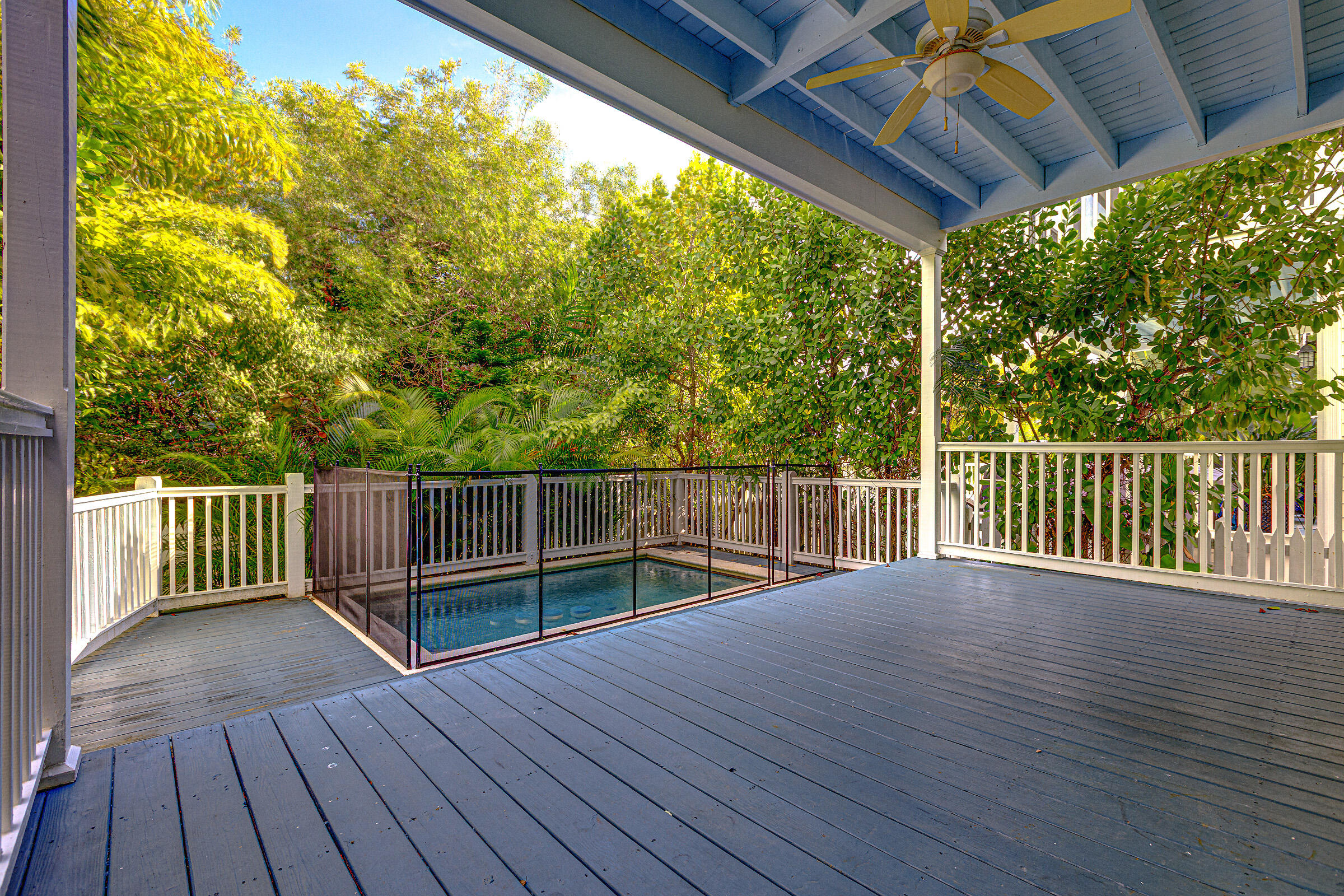 263 Golf Club Drive Key West, FL 33040 - Photo 13 of 30 a balcony with wooden floor