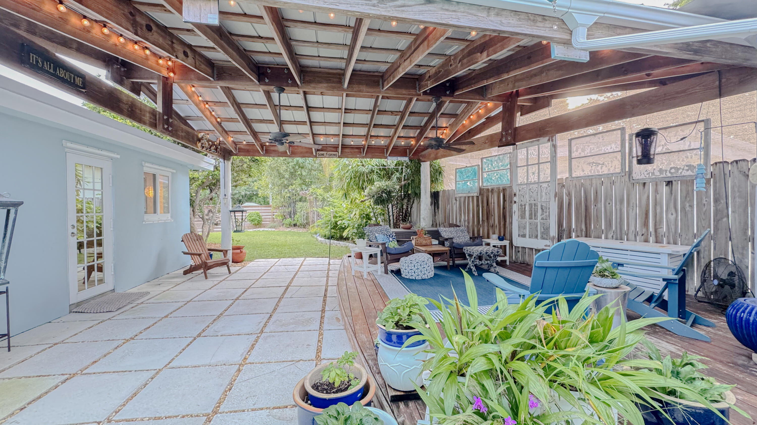 160 Ridge Street Tavernier, FL 33070 - Photo 18 of 25 a view of a chairs and table in a patio
