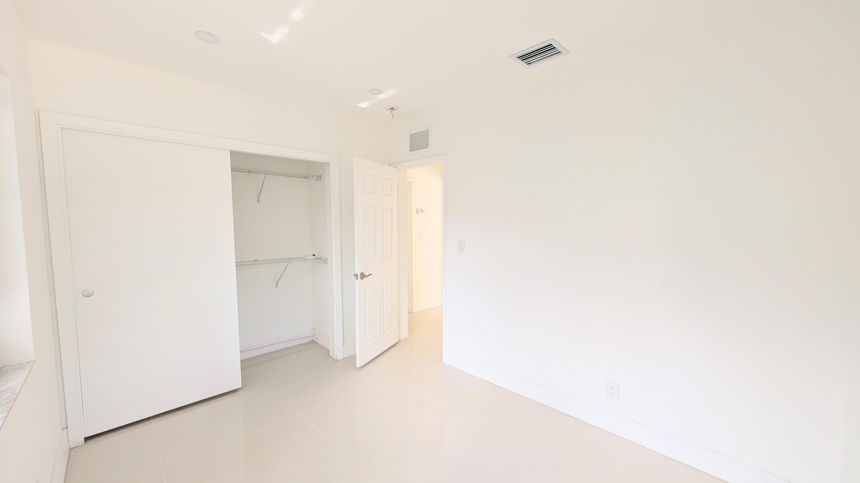 3840 Northeast 22nd Terrace Lighthouse Point, FL 33064 - Photo 12 of 18 a view of an empty room