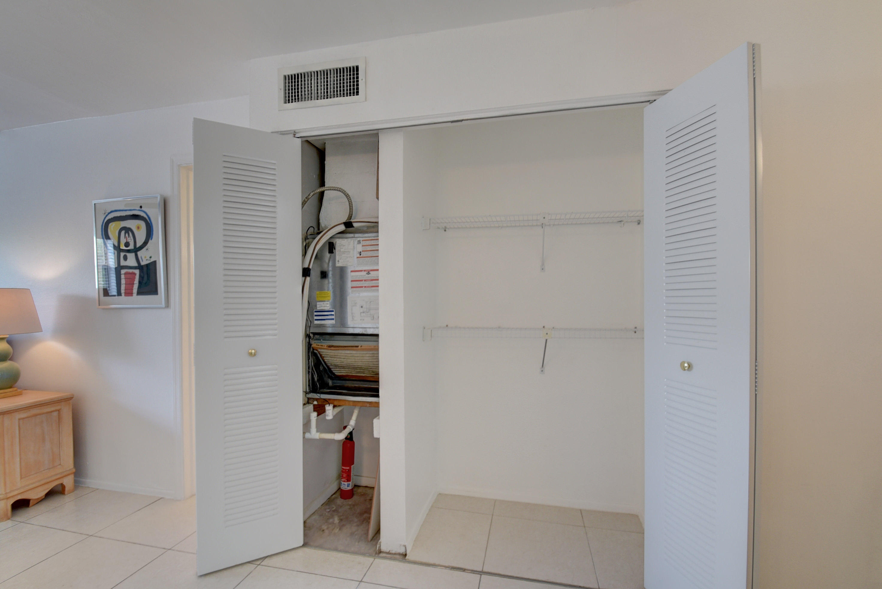 550 Southwest 2nd Avenue, Unit 125 Boca Raton, FL 33432 - Photo 10 of 14 AC & 2nd Closet