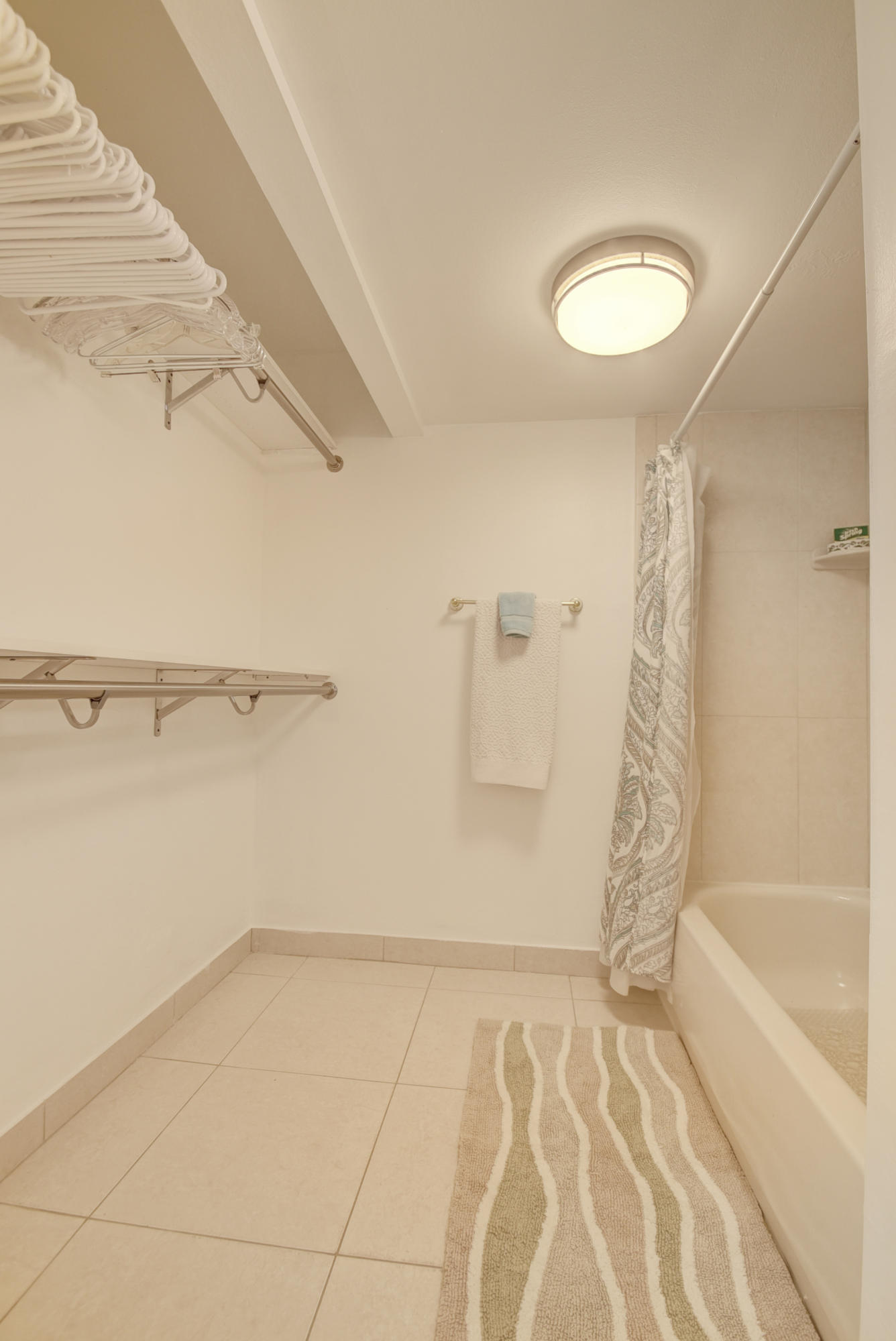 550 Southwest 2nd Avenue, Unit 125 Boca Raton, FL 33432 - Photo 9 of 14 Closet & Shower Tub