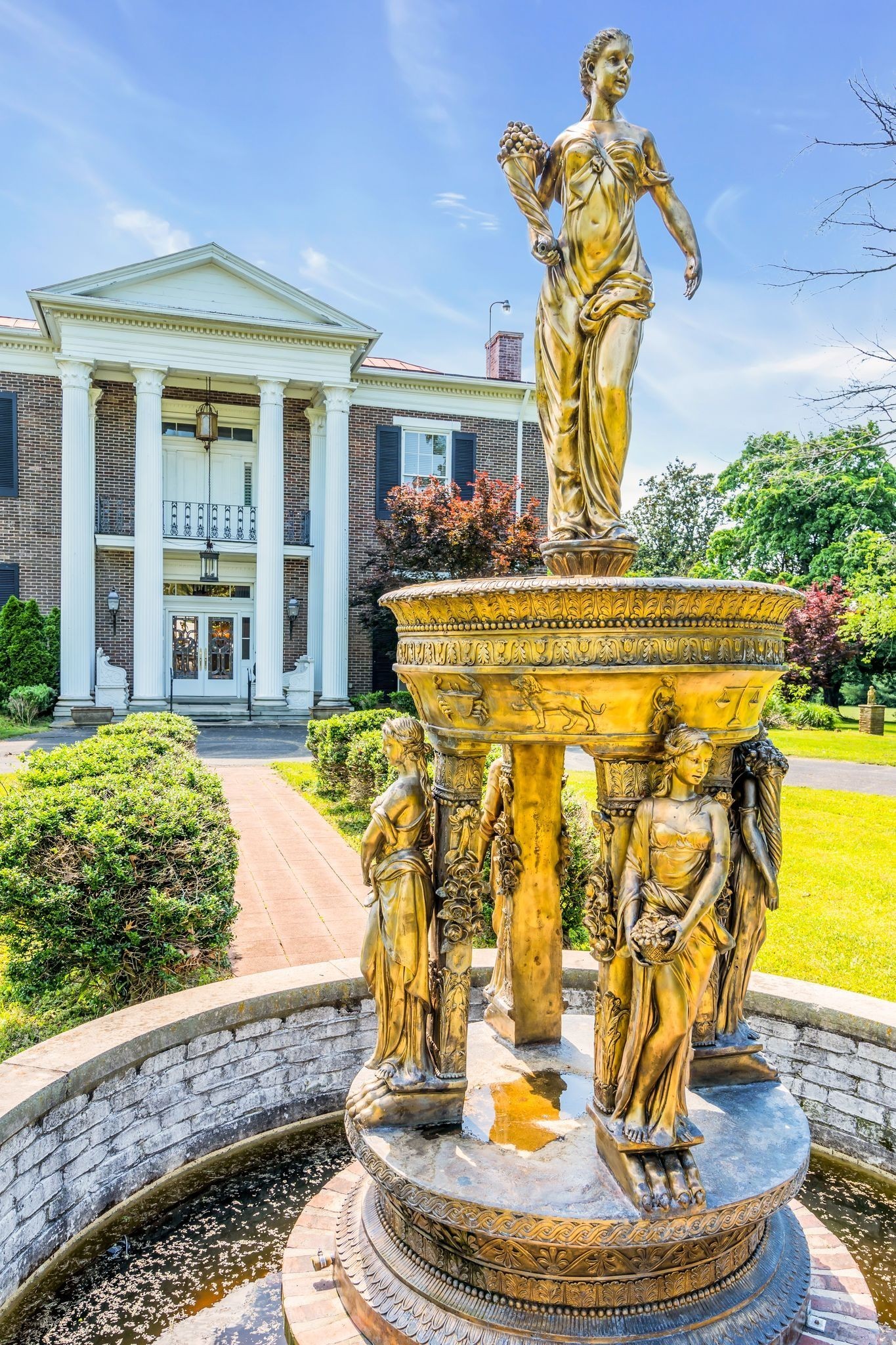 1112 Franklin Road Brentwood, TN 37027 - Photo 23 of 68 a view of a swimming pool with a fountain in the background