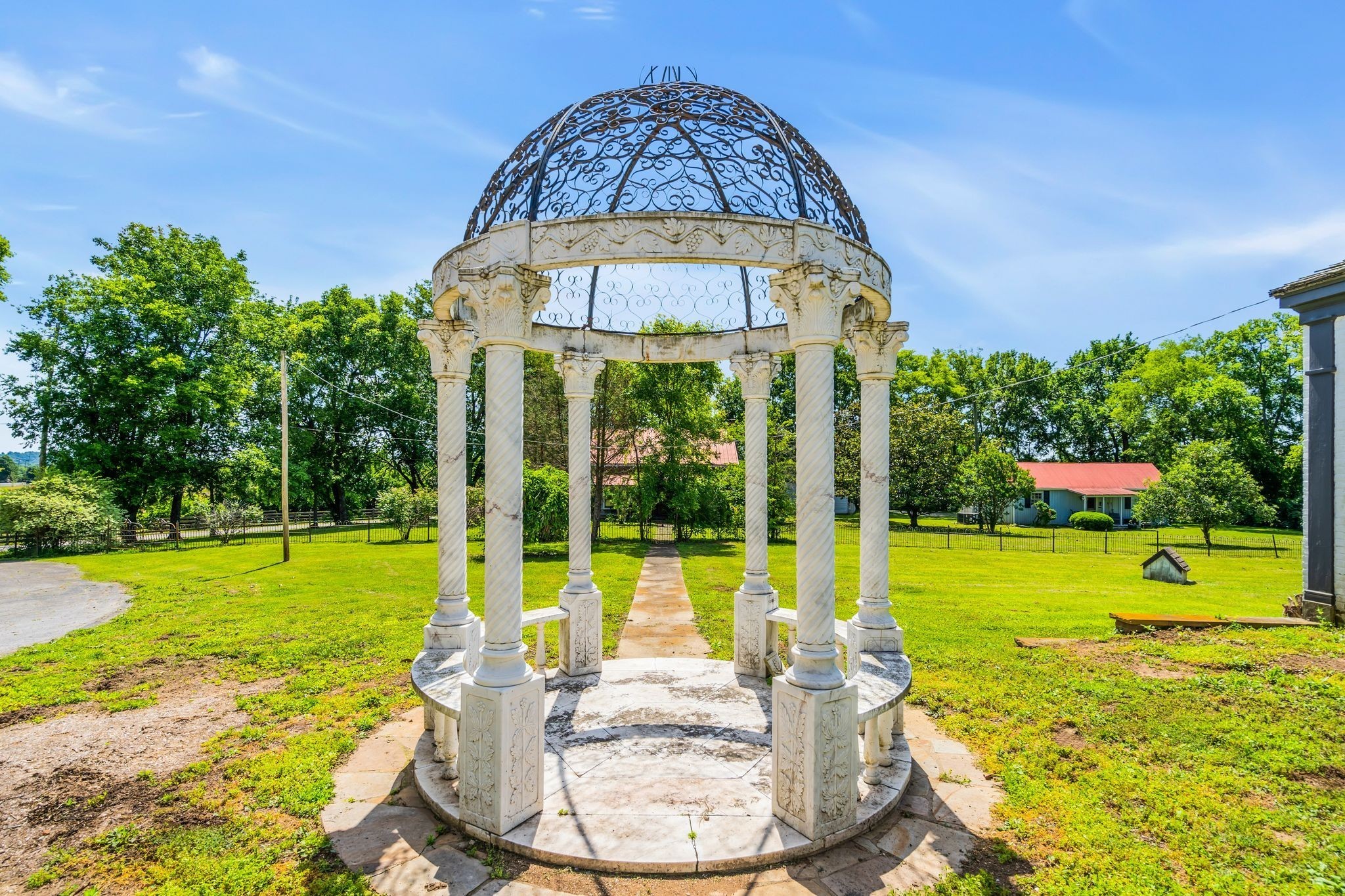 1112 Franklin Road Brentwood, TN 37027 - Photo 29 of 68 a view of a big room with a big yard and potted plants