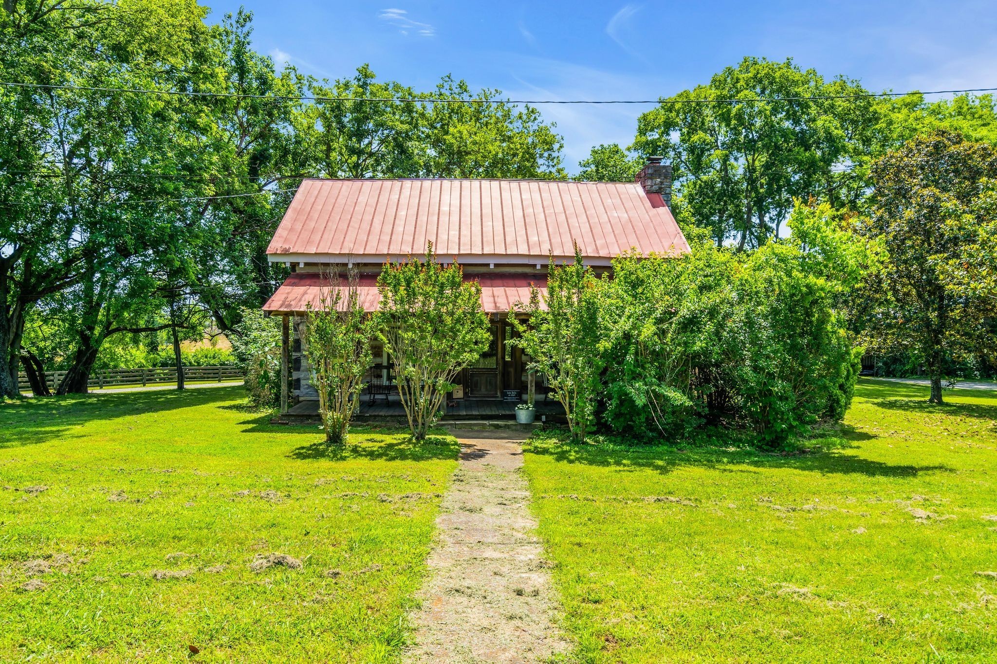 1112 Franklin Road Brentwood, TN 37027 - Photo 34 of 68 a view of a backyard with a garden