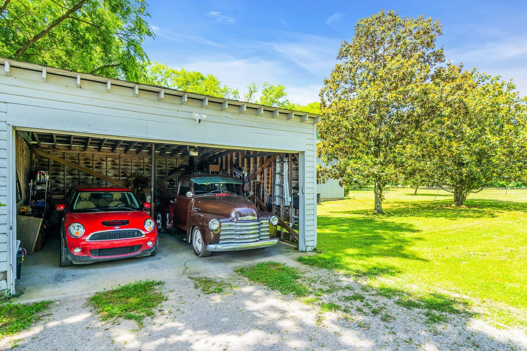 1112 Franklin Road Brentwood, TN 37027 - Photo 39 of 68 a view of a car is parked in the yard