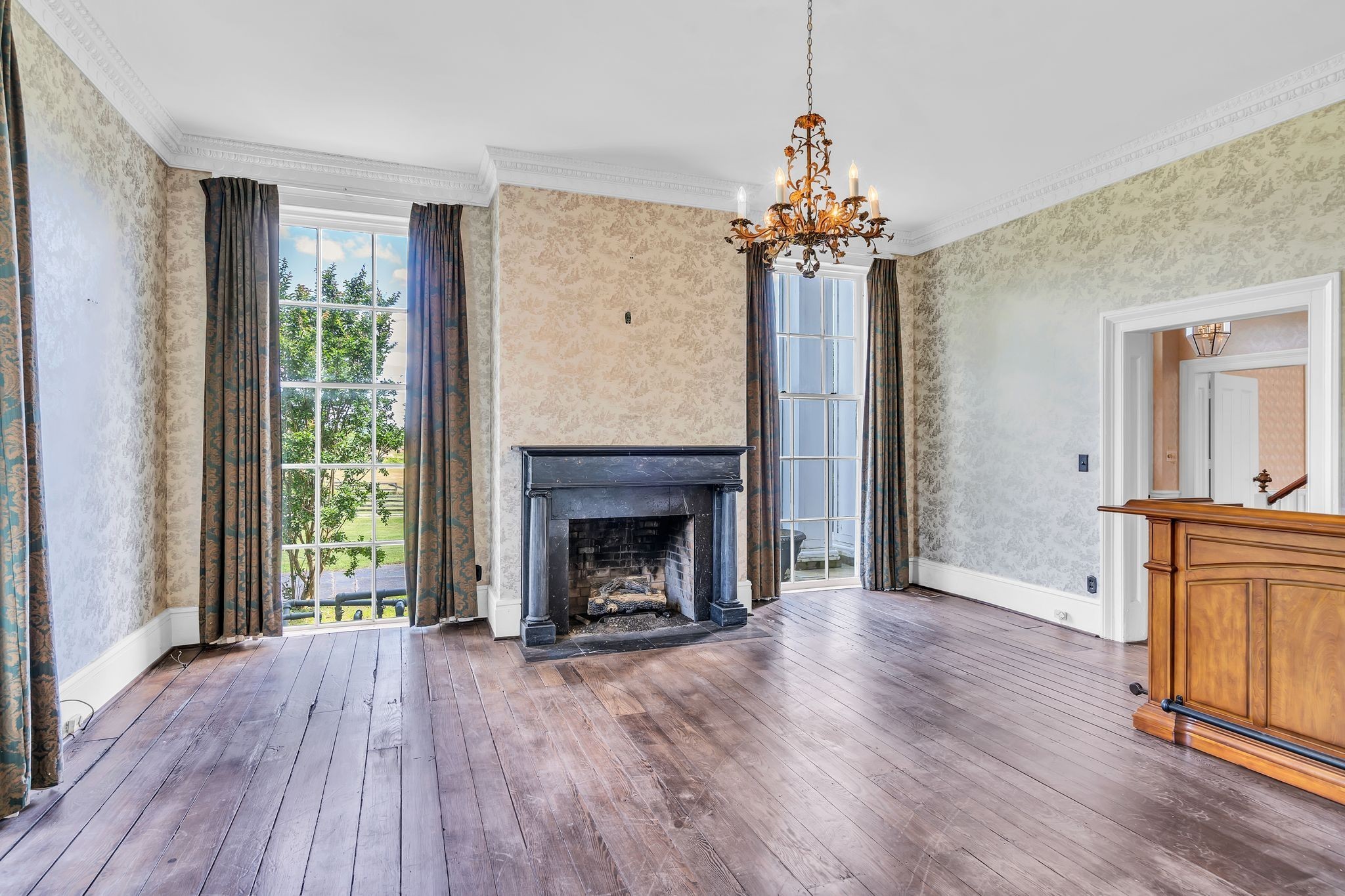 1112 Franklin Road Brentwood, TN 37027 - Photo 42 of 68 a view of a livingroom with a fireplace and wooden floor