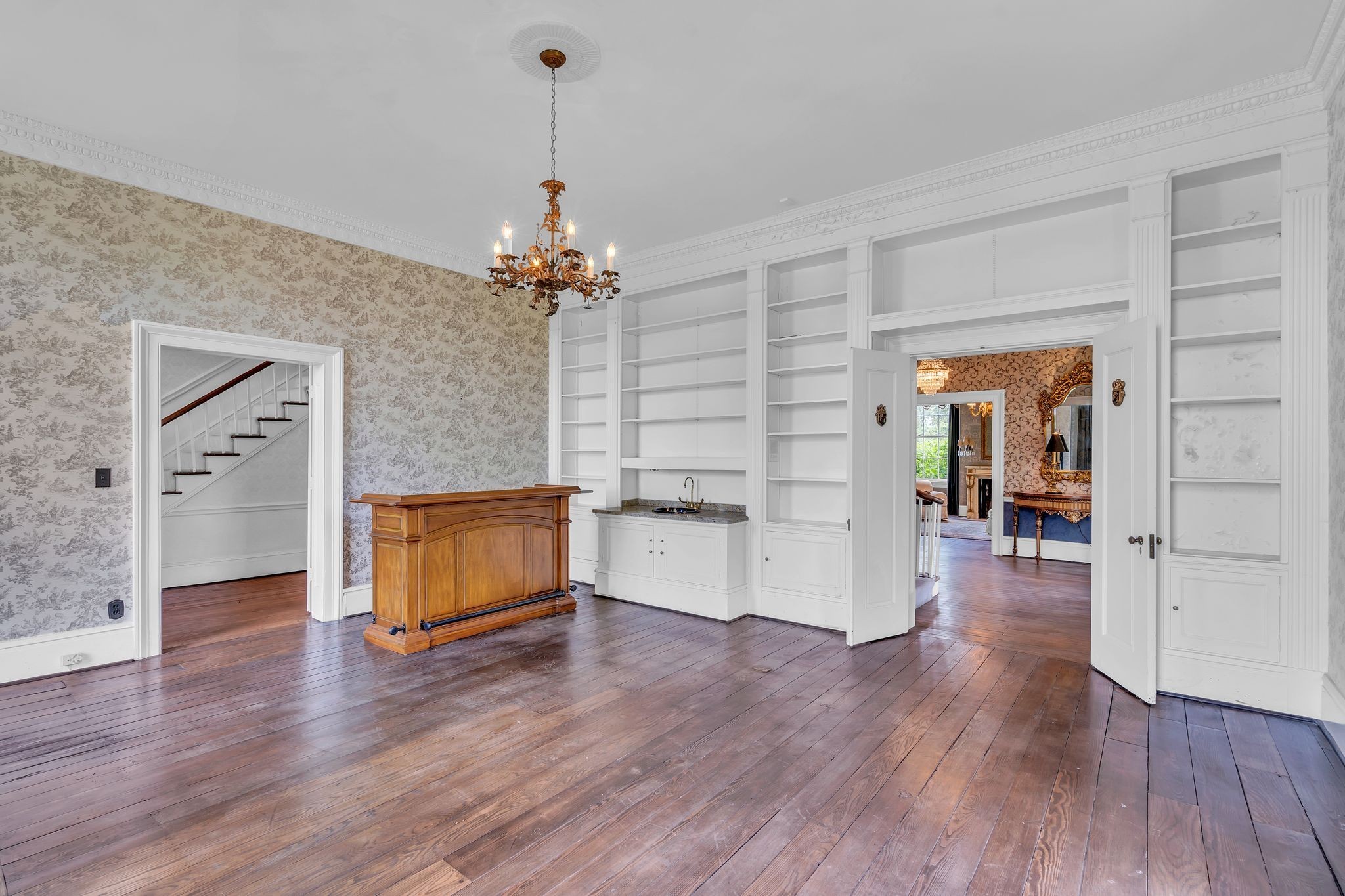 1112 Franklin Road Brentwood, TN 37027 - Photo 43 of 68 a view of a livingroom with wooden floor and a ceiling fan