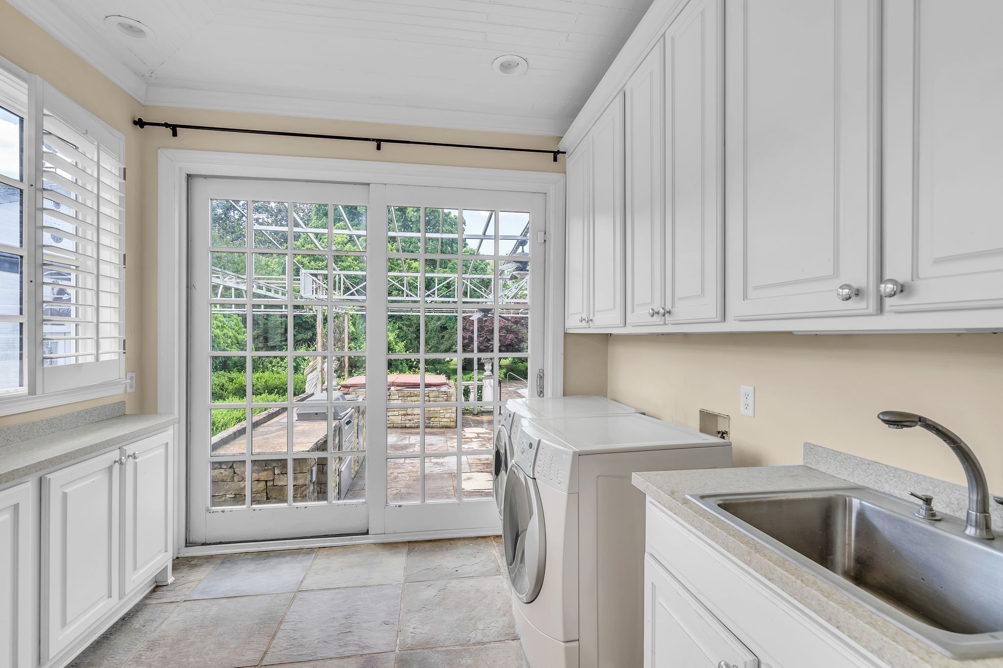 1112 Franklin Road Brentwood, TN 37027 - Photo 50 of 68 a kitchen with a sink and cabinets