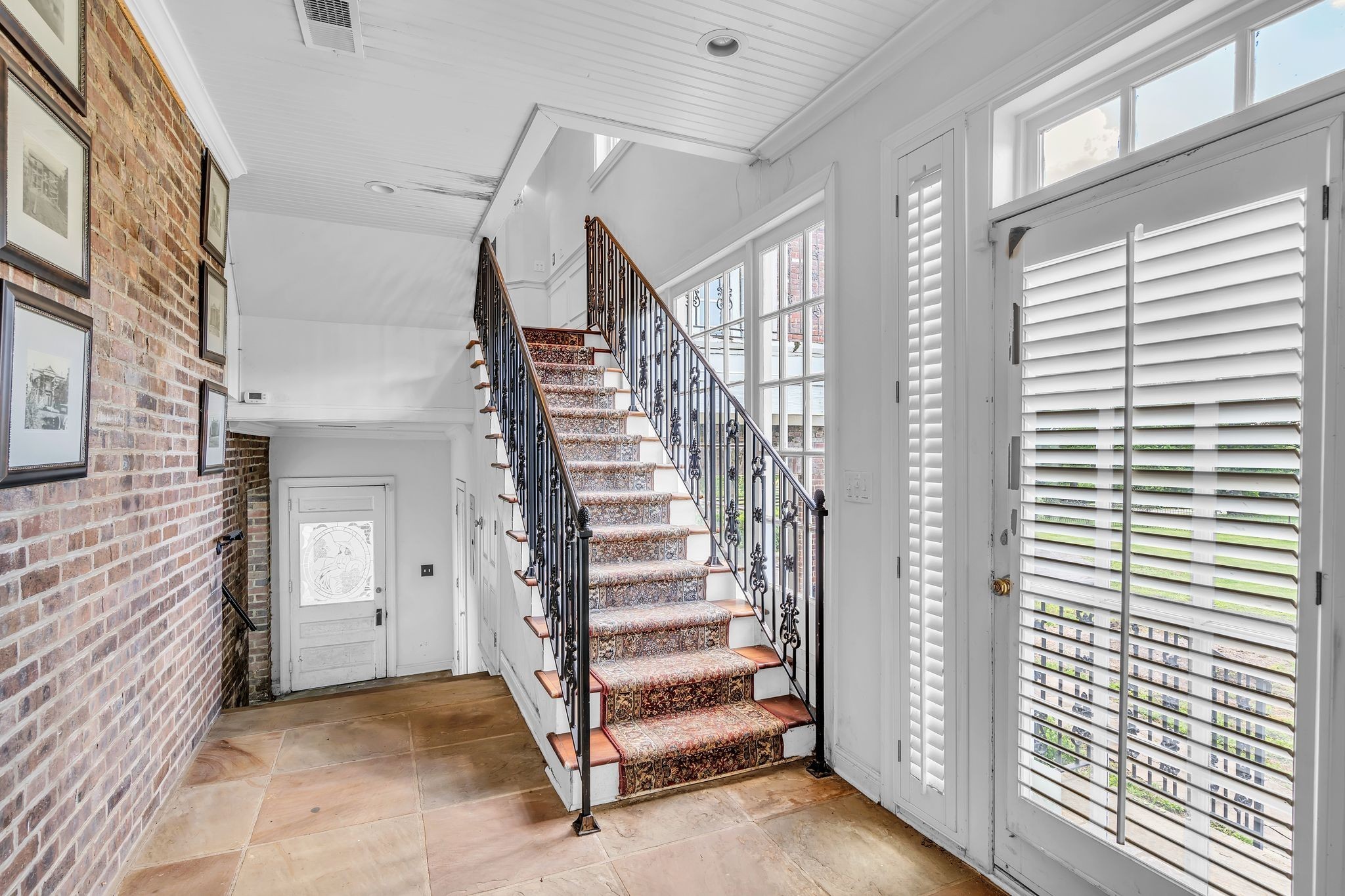 1112 Franklin Road Brentwood, TN 37027 - Photo 51 of 68 a view of entryway with stairs and wooden floor