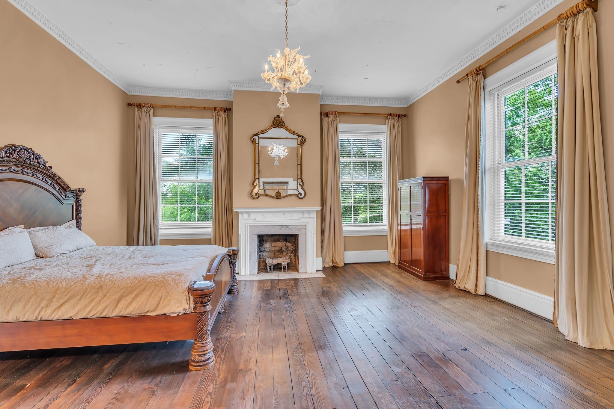 1112 Franklin Road Brentwood, TN 37027 - Photo 53 of 68 a bedroom with a bed and a fireplace