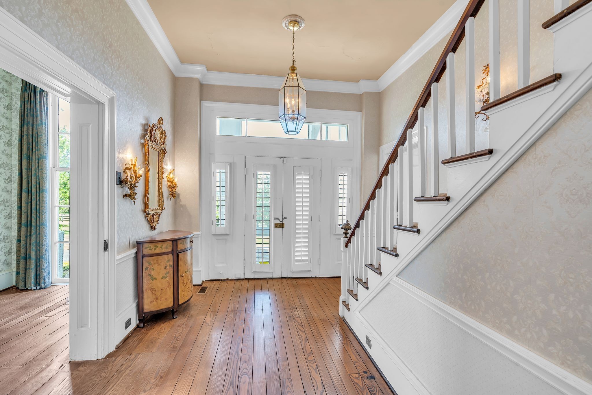 1112 Franklin Road Brentwood, TN 37027 - Photo 68 of 68 a view of an entryway with wooden floor and staircase