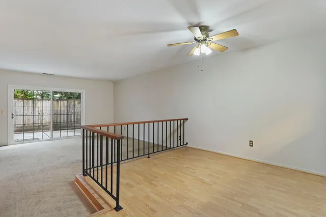 wooden floor in a room with a window