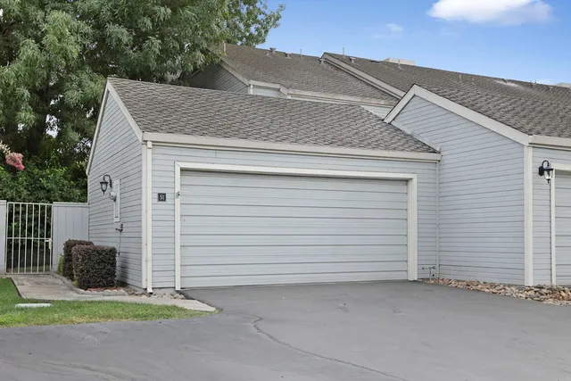 a view of a house with a garage